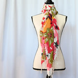 Vibrant floral scarf 28" x 70" in a soft poly/cotton/viscose blend.