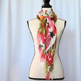 Vibrant floral scarf 28" x 70" in a soft poly/cotton/viscose blend.