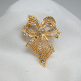 Vintage Gold‑Tone Rhinestone Bow Brooch – 1.75" x 2.25" – .5