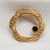 Vintage Gold‑Tone Open Circle Brooch with Black Stone Accent – 1" – .2 oz