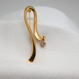 Vintage Gold‑Tone Abstract Curve Brooch w/ Dangling Crystal – 2.5"