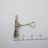 Vintage Gold‑Tone Tie Clip w/ Dangling Handcuff Charm – 2"