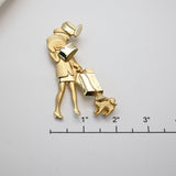 Vintage Gold‑Tone Shopper & Dog Brooch – 2.75"