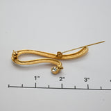 Vintage Gold‑Tone Abstract Curve Brooch w/ Dangling Crystal – 2.5"