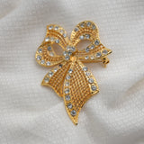 Vintage Gold‑Tone Rhinestone Bow Brooch – 1.75" x 2.25" – .5