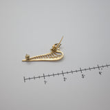 Vintage Gold‑Tone Openwork Brooch – Curved Filigree Design with Accent Stones