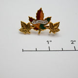 Vintage St. Joseph Maple Leaf Pin – Gold‑Tone with Enamel – 1.5" × .75"